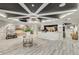 Bright lobby area featuring modern decor, stylish flooring, and a welcoming reception desk at 200 River Vista Dr # 713, Atlanta, GA 30339