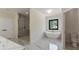 Bright bathroom featuring a soaking tub, walk-in shower, and a separate toilet room at 208 Indian Hills Trail, Marietta, GA 30068