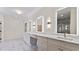 Spacious primary bathroom featuring dual vanities, marble counters, and elegant lighting at 208 Indian Hills Trail, Marietta, GA 30068