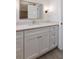 Bathroom featuring a modern vanity with a large mirror, stylish lighting and designer fixtures at 208 Indian Hills Trail, Marietta, GA 30068