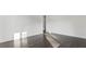 Sunlit room showcasing gleaming hardwood floors and neutral walls, perfect for any decor at 208 Indian Hills Trail, Marietta, GA 30068
