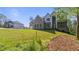 Well manicured lawn surrounds this brick and painted two-story home at 208 Indian Hills Trail, Marietta, GA 30068
