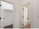 Hallway featuring doors to closet and bathroom at 208 Indian Hills Trail, Marietta, GA 30068