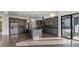 Full kitchen with stainless steel appliances and black countertops at 208 Indian Hills Trail, Marietta, GA 30068
