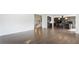 Open-concept room with view of kitchen, hardwood floors, and modern decor at 208 Indian Hills Trail, Marietta, GA 30068