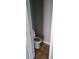 A small bathroom features a toilet and flooring at 8628 Thomas Rd, Riverdale, GA 30274