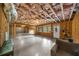 Unfinished basement space featuring exposed beams and wall studs is ready for customization to suit your needs at 332 Chaffin Rd, Roswell, GA 30075
