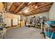 Unfinished basement with storage shelving, electrical components, and insulated ceiling, ready for customization at 332 Chaffin Rd, Roswell, GA 30075