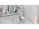 Bathroom features granite countertop and white cabinets, blending modern style with classic appeal at 332 Chaffin Rd, Roswell, GA 30075