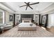 Bedroom with a ceiling fan, sitting chairs and lots of natural light at 332 Chaffin Rd, Roswell, GA 30075