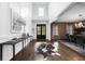 Welcoming foyer with hardwood floors, soaring ceilings, designer decor and double-door entry at 332 Chaffin Rd, Roswell, GA 30075