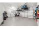 Spacious garage with epoxy floors, storage solutions, and ample space at 332 Chaffin Rd, Roswell, GA 30075