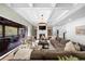 Inviting living room featuring a fireplace, plush sofa and adjacent covered patio at 332 Chaffin Rd, Roswell, GA 30075
