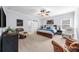 Spacious main bedroom is complete with barn door, seating area, and ensuite bath at 332 Chaffin Rd, Roswell, GA 30075