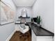 Cozy office with built-in desk, sleek decor, and a mounted world map at 332 Chaffin Rd, Roswell, GA 30075