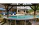 Inviting view of the pool with lounge chairs and bar, perfect for relaxing or entertaining guests at 332 Chaffin Rd, Roswell, GA 30075