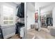Bright walk-in closet with clothing racks and natural light at 332 Chaffin Rd, Roswell, GA 30075