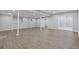 Spacious basement featuring new floors and neutral paint, ready for customization at 4718 Lou Ivy Rd, Peachtree Corners, GA 30096