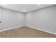 Cozy bedroom with new floors and neutral paint, ready for personalization at 4718 Lou Ivy Rd, Peachtree Corners, GA 30096