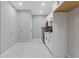 Second kitchen featuring modern appliances and ample storage space at 4718 Lou Ivy Rd, Peachtree Corners, GA 30096