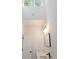 Well lit bathroom features high ceilings, a modern sink, and white walls at 2438 Shadburn Ferry Dr, Buford, GA 30518