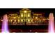 Night view of a community theater with fountains and lights, offering a cultural and entertainment experience at 2438 Shadburn Ferry Dr, Buford, GA 30518