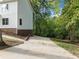Long driveway leads to this beautiful home with ample space for parking at 2438 Shadburn Ferry Dr, Buford, GA 30518
