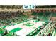 Full view of a spacious gymnasium with bright lighting, green seats, and many people at 2438 Shadburn Ferry Dr, Buford, GA 30518