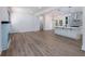 Bright open-concept layout with seamless flow between the living room, kitchen, and outdoor spaces at 2438 Shadburn Ferry Dr, Buford, GA 30518