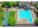 An aerial view of a luxurious pool, area, and basketball court at the community clubhouse at 3605 Grey Abbey Dr, Alpharetta, GA 30022