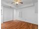Bedroom features hardwood floors, recessed lighting, ceiling fan, and neutral walls at 3605 Grey Abbey Dr, Alpharetta, GA 30022
