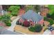 Beautiful two-story brick home with well-manicured landscaping and driveway at 3605 Grey Abbey Dr, Alpharetta, GA 30022