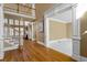 Spacious foyer with hardwood flooring, staircase and high ceilings offering a view of the upper floor at 3605 Grey Abbey Dr, Alpharetta, GA 30022
