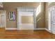 Foyer with beautiful hardwood floors and decorative entrance way at 3605 Grey Abbey Dr, Alpharetta, GA 30022