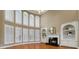 Bright and airy living room boasts a fireplace, built-in shelves, and large windows at 3605 Grey Abbey Dr, Alpharetta, GA 30022