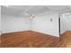 Spacious room with hardwood floors, a ceiling fan, and recessed lighting at 3605 Grey Abbey Dr, Alpharetta, GA 30022