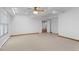 Large room with tile flooring, recessed lighting, ceiling fan, and big windows at 3605 Grey Abbey Dr, Alpharetta, GA 30022