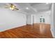Hardwood floors, recessed lights, and a modern ceiling, enhance this spacious living area at 3605 Grey Abbey Dr, Alpharetta, GA 30022
