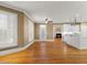 Open-concept area shows living room and kitchen with hardwood floors and natural lighting at 3605 Grey Abbey Dr, Alpharetta, GA 30022