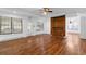 Bright living room featuring hardwood floors, built-ins, and lots of natural light at 3605 Grey Abbey Dr, Alpharetta, GA 30022