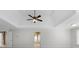 Bright main bedroom features a tray ceiling, fan, and ensuite bath at 3605 Grey Abbey Dr, Alpharetta, GA 30022
