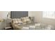 This bedroom has a modern headboard and matching side tables on both sides of the bed at 4203 Fairington Village Dr, Lithonia, GA 30038