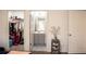 This bedroom features a walk-in closet and an ensuite bathroom with neutral-toned walls at 4203 Fairington Village Dr, Lithonia, GA 30038