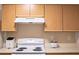Functional kitchen offering essential appliances and ample cabinet space at 4203 Fairington Village Dr, Lithonia, GA 30038