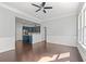 Bright living room with hardwood floors and open to the kitchen area, perfect for Gathering gatherings at 4236 Silver Spruce Ln, Smyrna, GA 30080