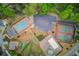 Aerial view showcasing the community pool, parking, and tennis courts at 1193 Colony Creek Ct, Lawrenceville, GA 30043