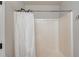 Bright bathroom featuring a shower stall with shower curtain at 1193 Colony Creek Ct, Lawrenceville, GA 30043