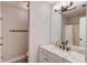 Modern bathroom featuring stylish fixtures, spacious vanity with granite countertop, and sleek design at 1193 Colony Creek Ct, Lawrenceville, GA 30043