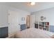 Charming bedroom with built-in bookcase, white trim, and ample closet space at 1193 Colony Creek Ct, Lawrenceville, GA 30043