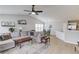 Spacious living room adjacent to the kitchen and dining area with vaulted ceilings at 1193 Colony Creek Ct, Lawrenceville, GA 30043
